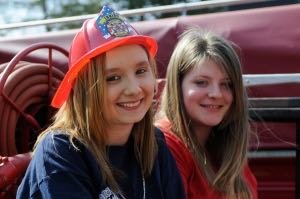 During the 100th anniversary of the NBVFD, Ruth Elliott was a 16-year-old firefighter from Hortonville. She is pictured on the left, with NBVFD Chief Alan Welton’s granddaughter, then 15, at right.